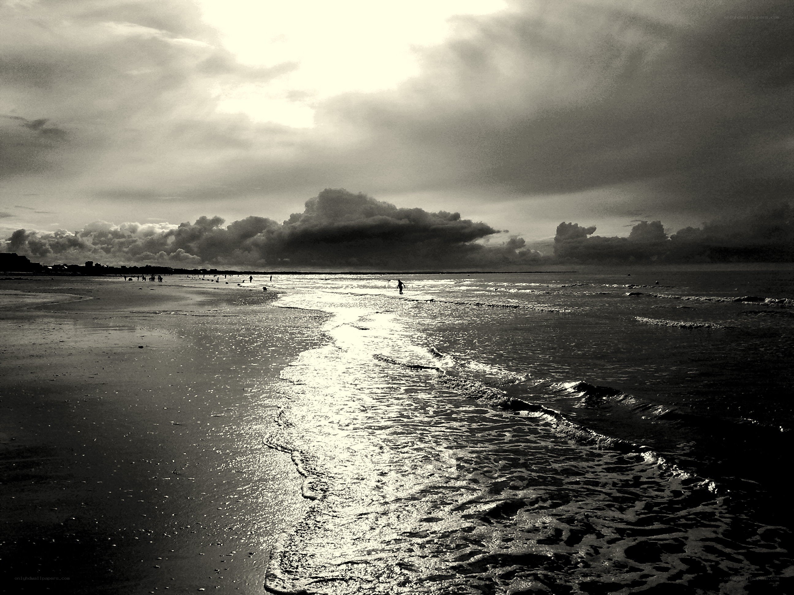 Beach at sunset with clouds