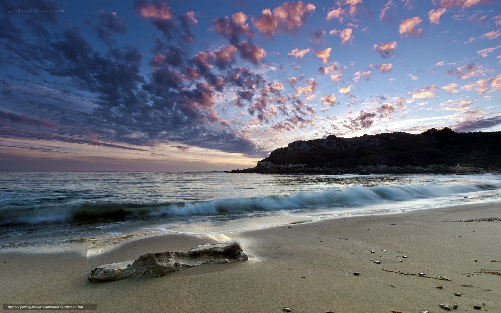 Beach at sunset with colorful sky