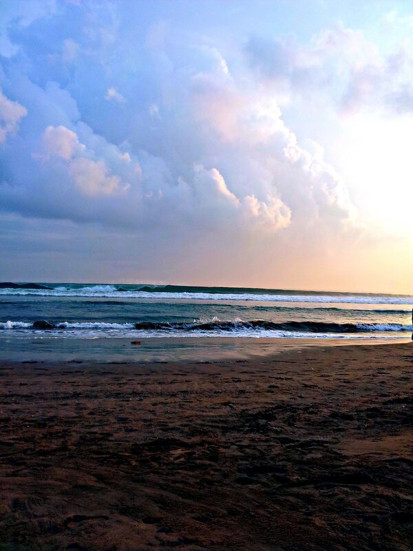 beach at sunset with waves