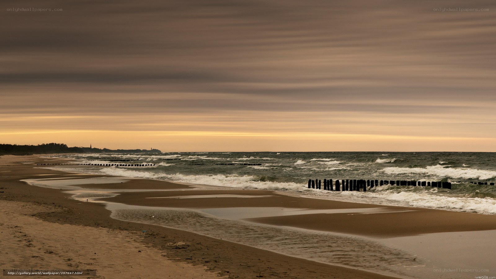 Beach at sunset with waves