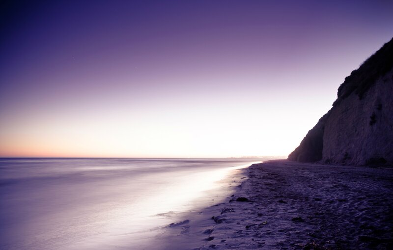 Beach at Twilight — Purple, Serene, Sunset, Photograph, Cliff, Ocean, Sky