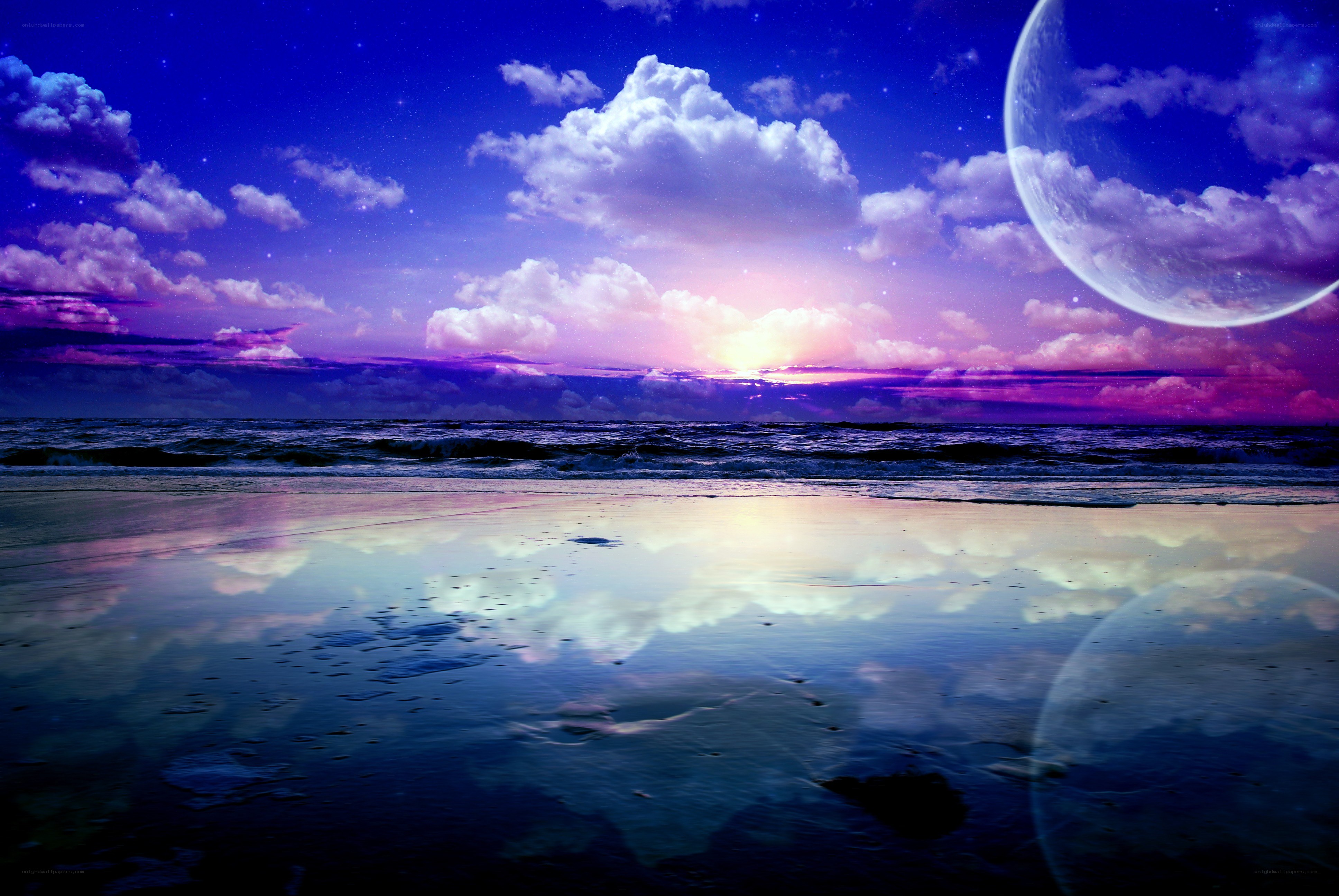 Beach at twilight with a large moon