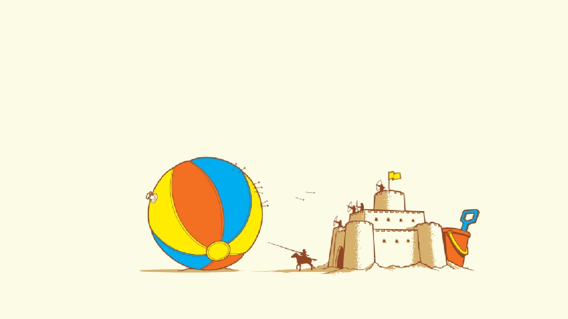 Beach ball and sandcastle