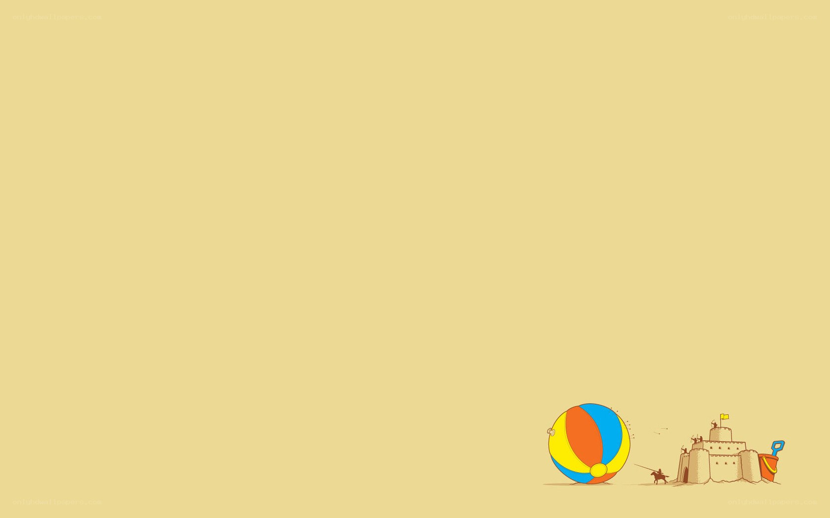 beach ball and sandcastle