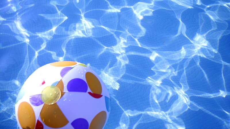beach ball in pool water