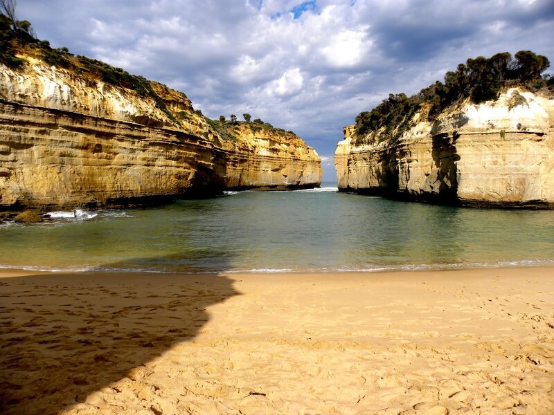 beach between cliffs