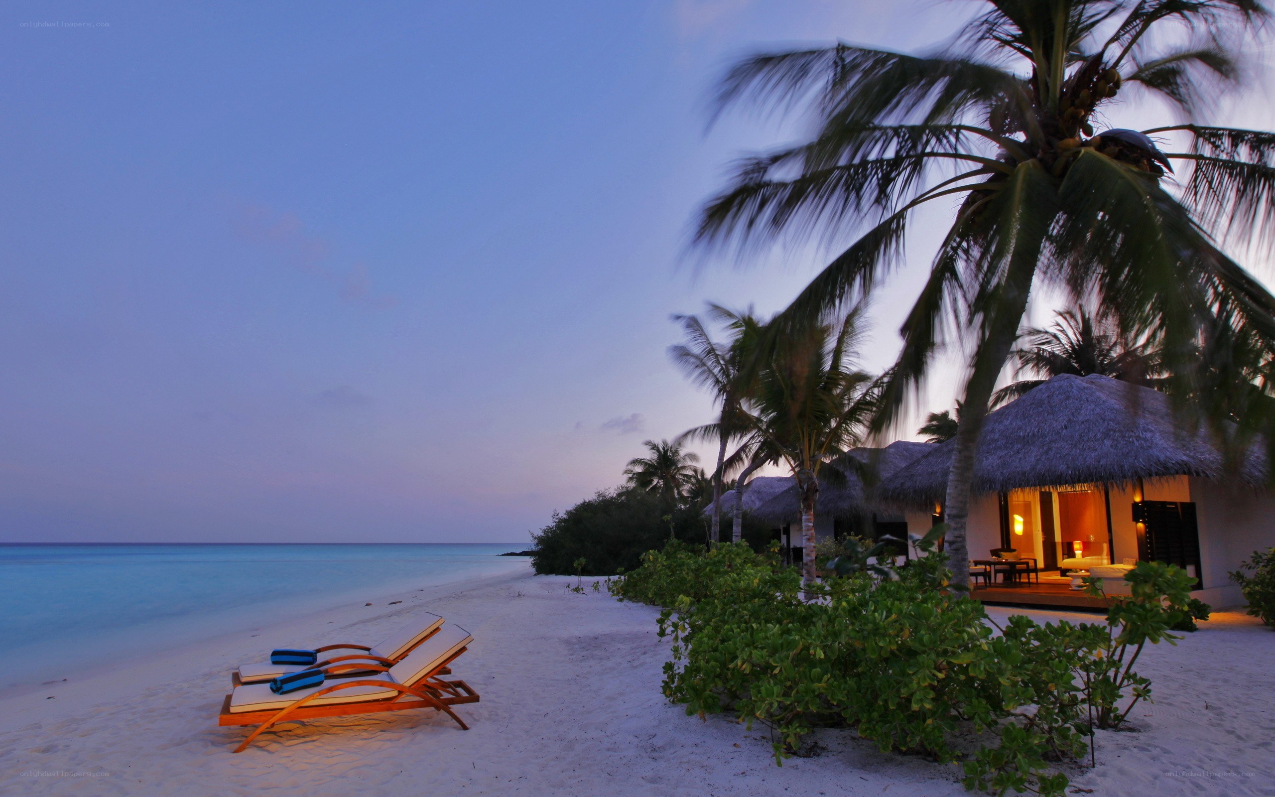 Beach bungalows at dusk