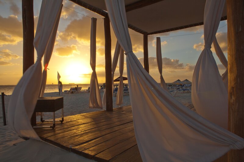 Beach cabana at sunset