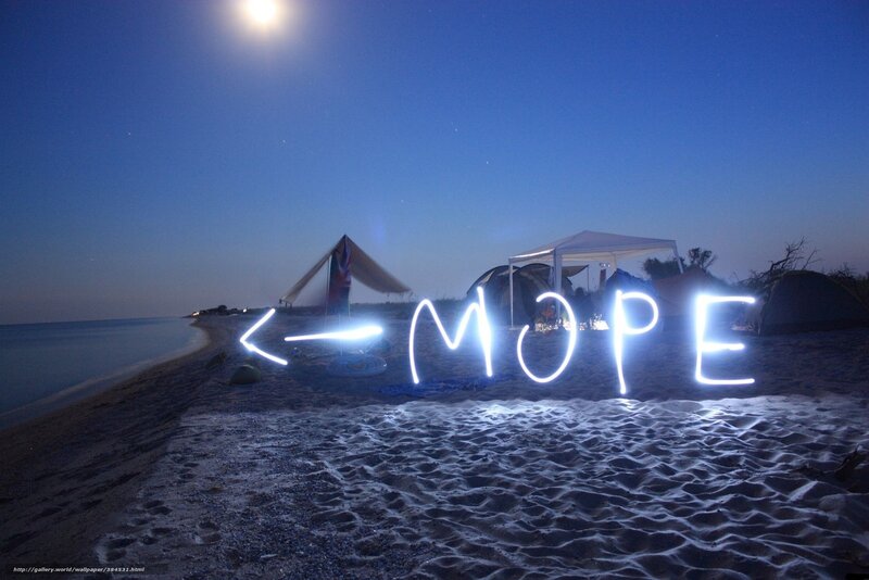 Beach camp under moonlight