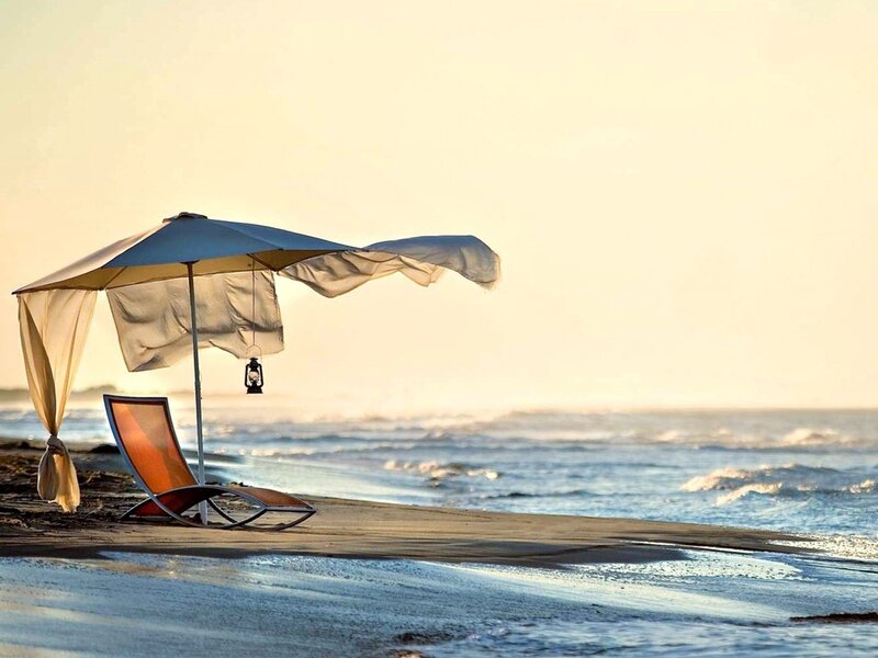 Beach Chair and Umbrella — Blue, Serene, Sunset, Photograph