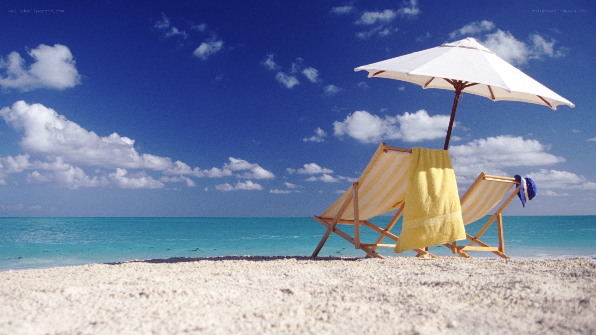 Beach chair under umbrella
