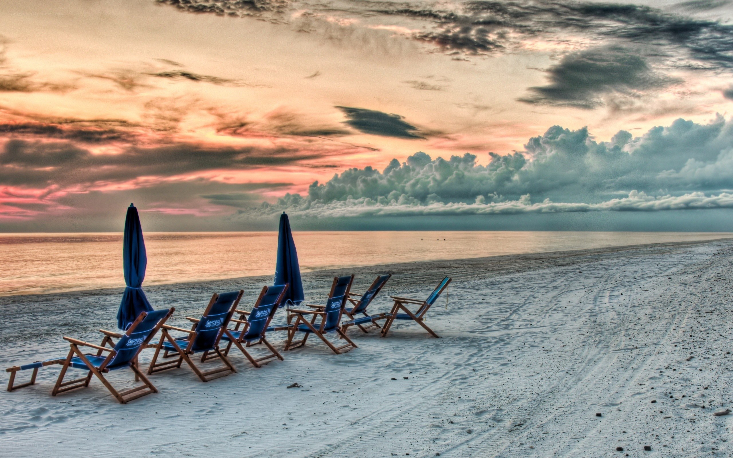 Beach chairs at sunset