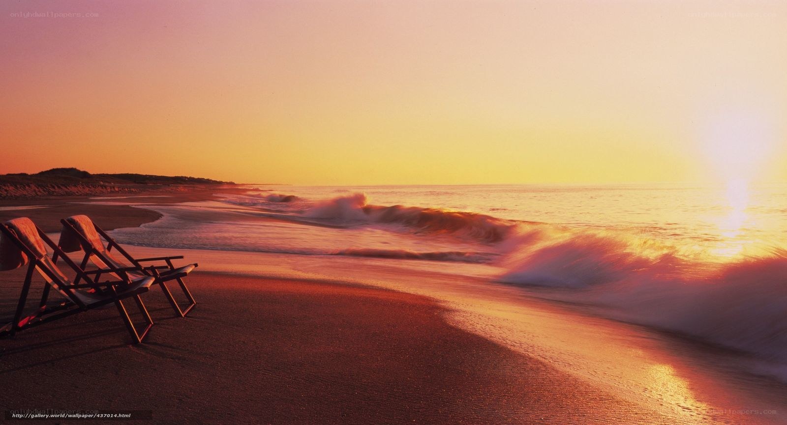 Beach chairs at sunset