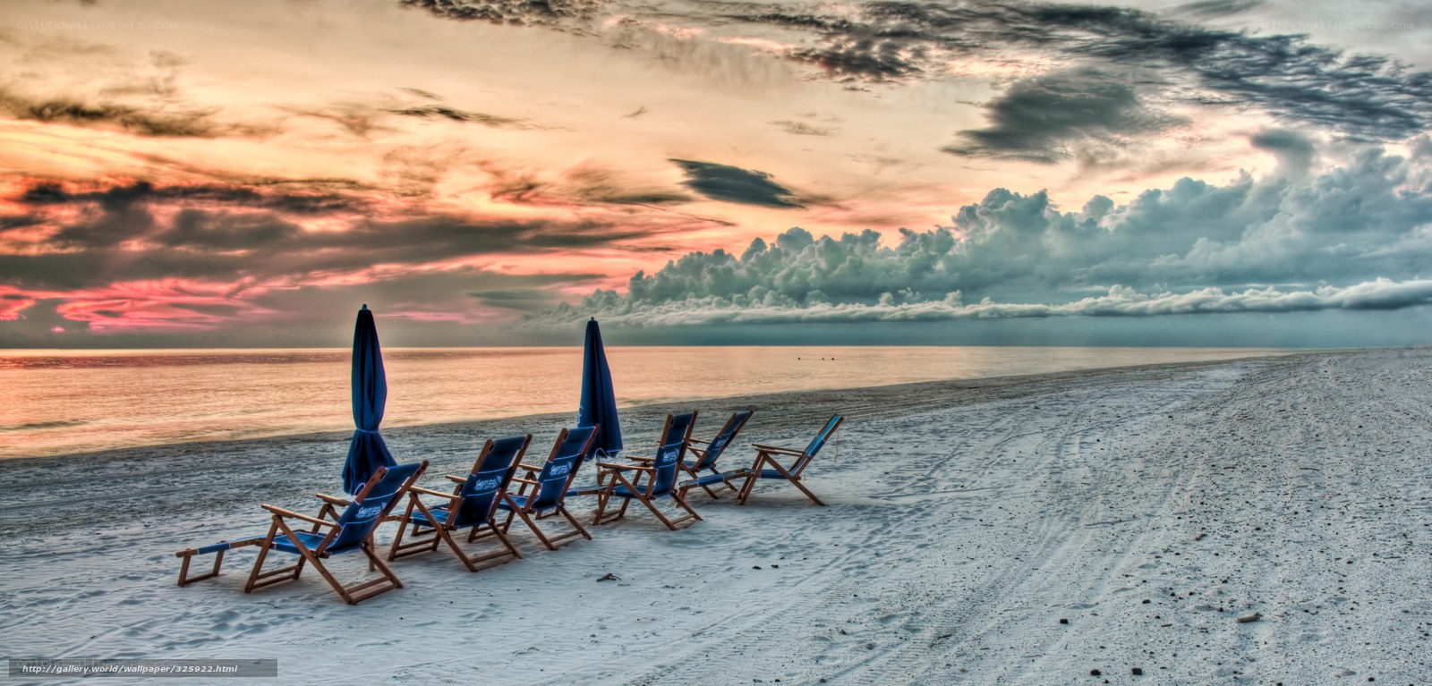 Beach chairs at sunset
