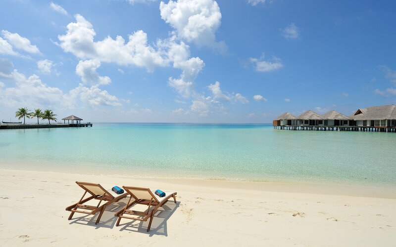 Beach Chairs on Sand — Blue, Serene, Afternoon, Photograph, Lounge Chairs, Overwater Bungalows