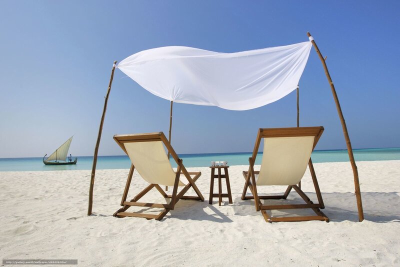 Beach chairs under canopy