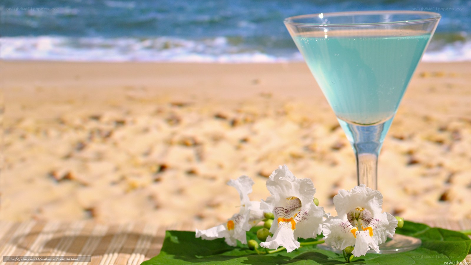 Beach cocktail with flowers
