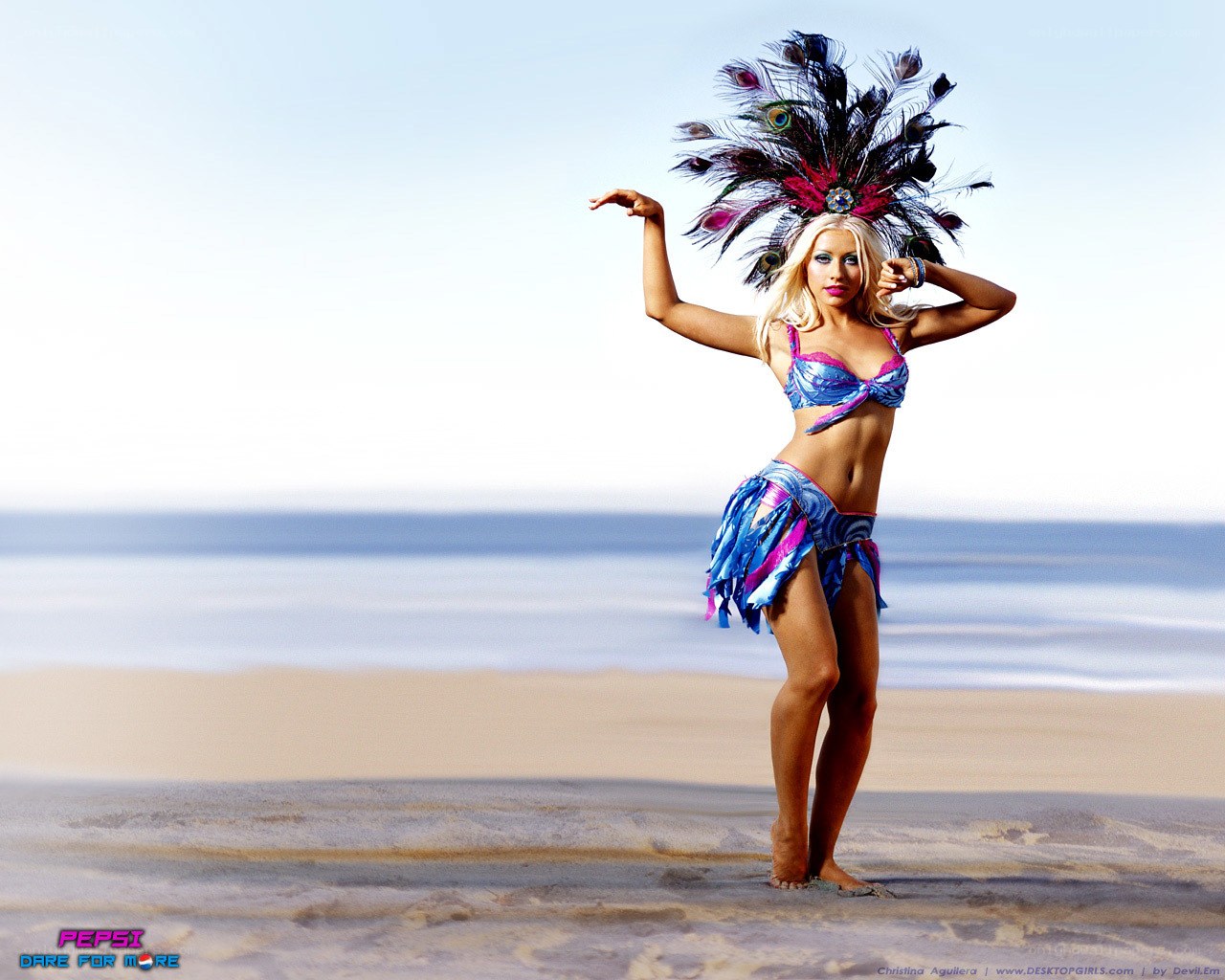 beach dancer in feather headdress