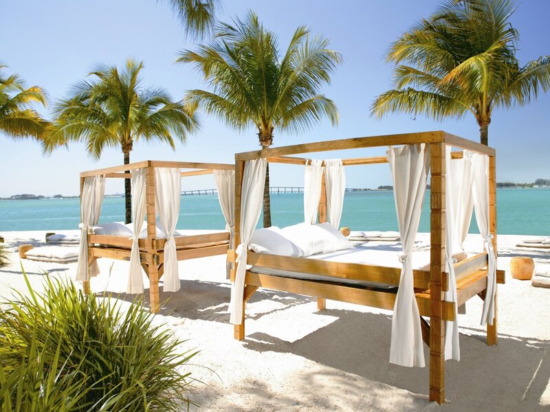 Beach Daybeds with Palm Trees