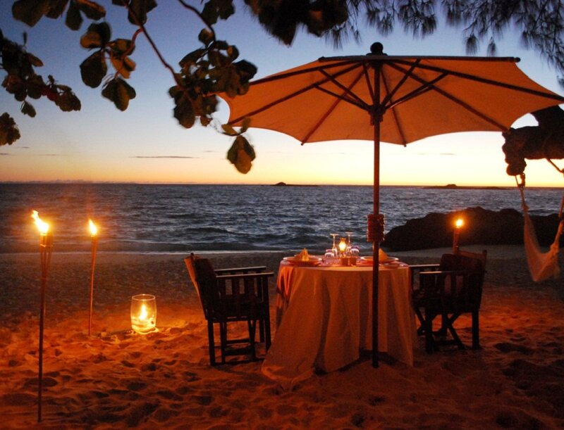 Beach Dinner Setup — Orange, Romantic