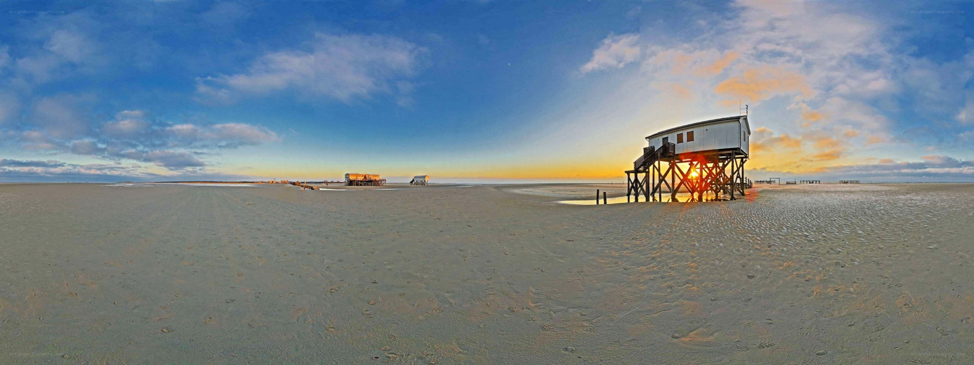 Beach hut at sunset