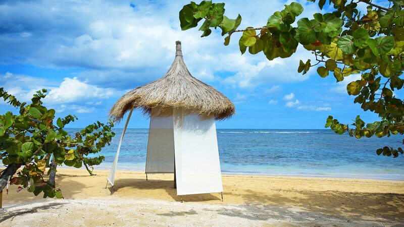 Beach hut on tropical shore