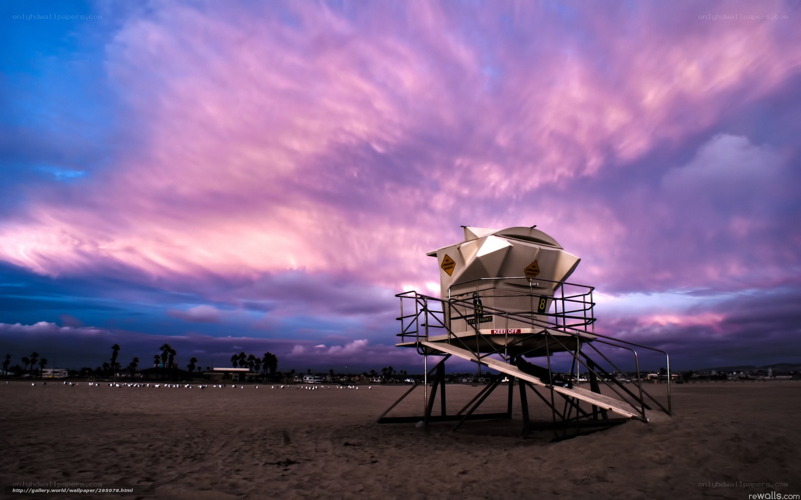 Beach lifeguard tower at sunset