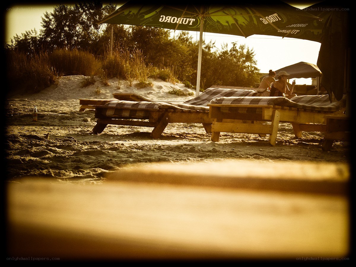 Beach lounge at sunset