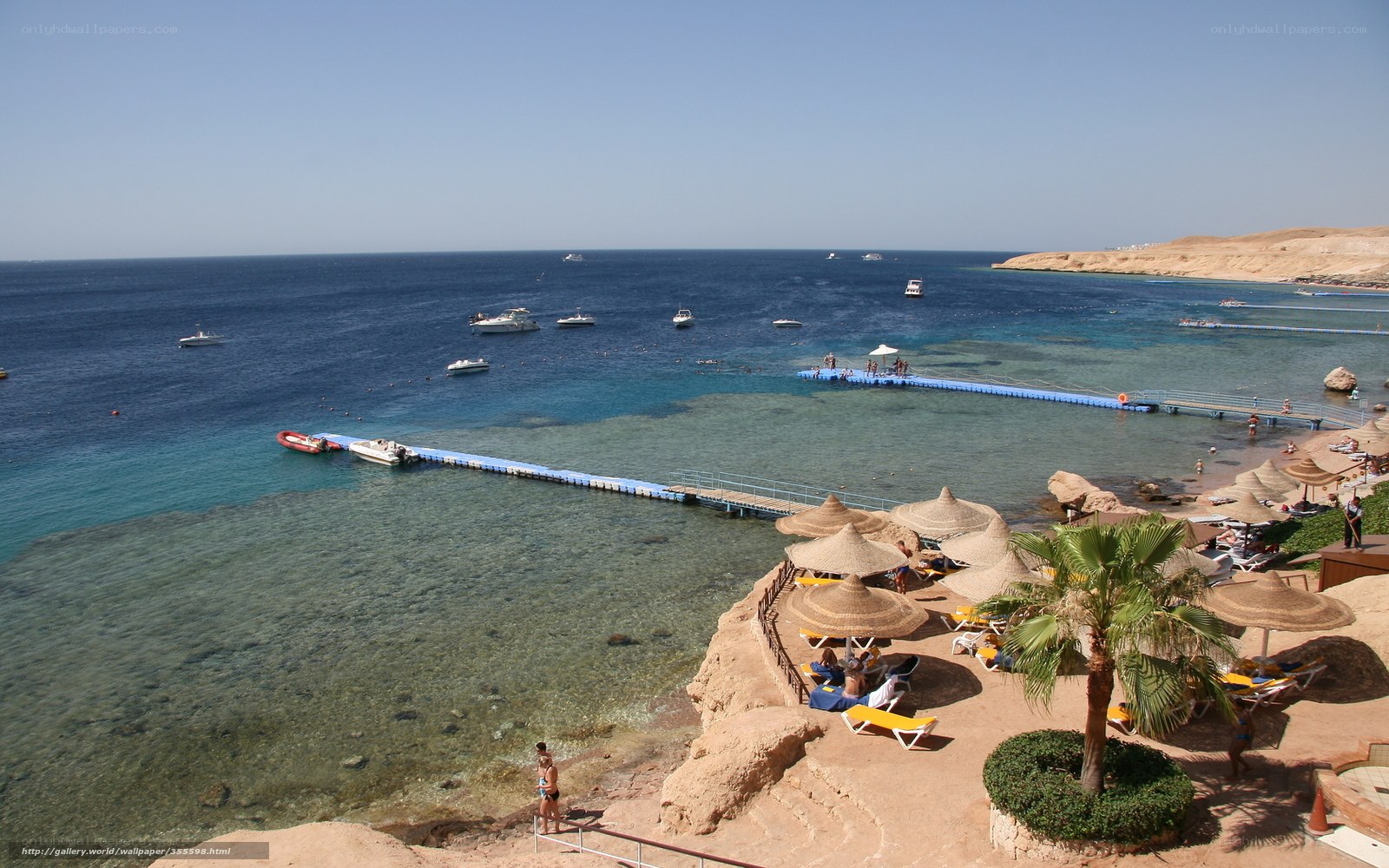 Beach resort with boats and docks