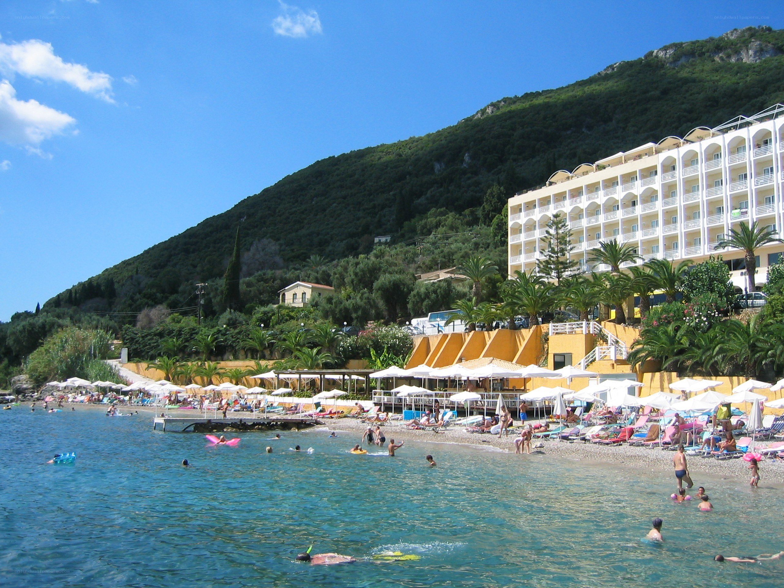 Beach resort with hotel and mountains
