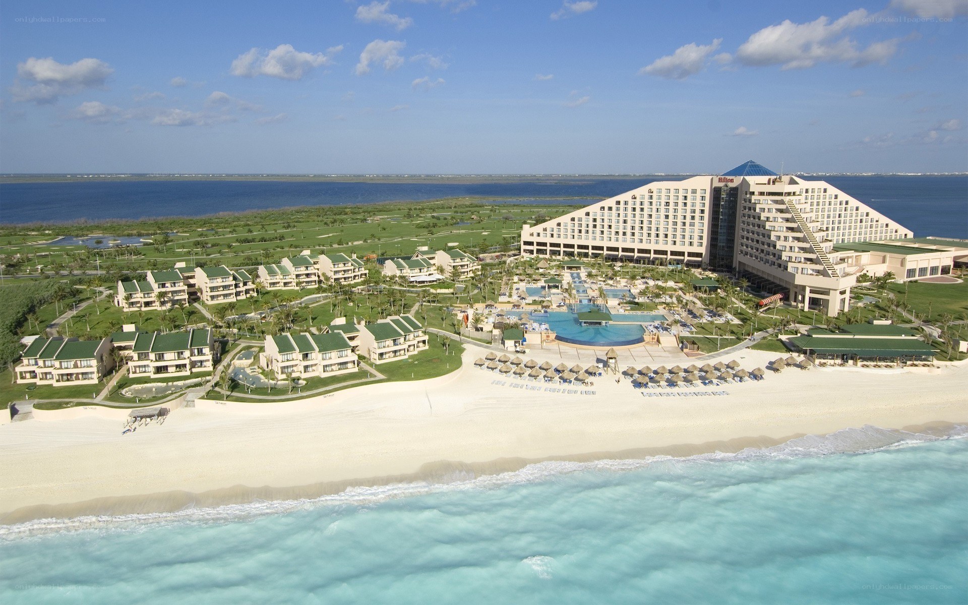 beach resort with pool and ocean