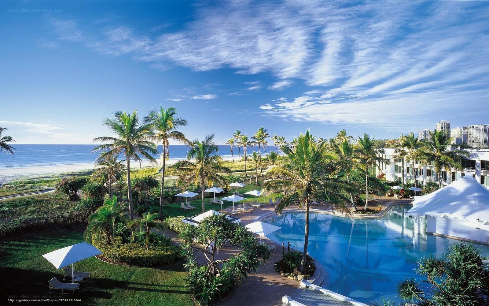 Beach resort with pool and palm trees
