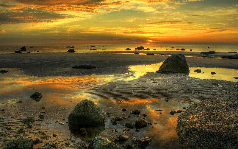 Beach Rocks at Sunset — Orange, Serene
