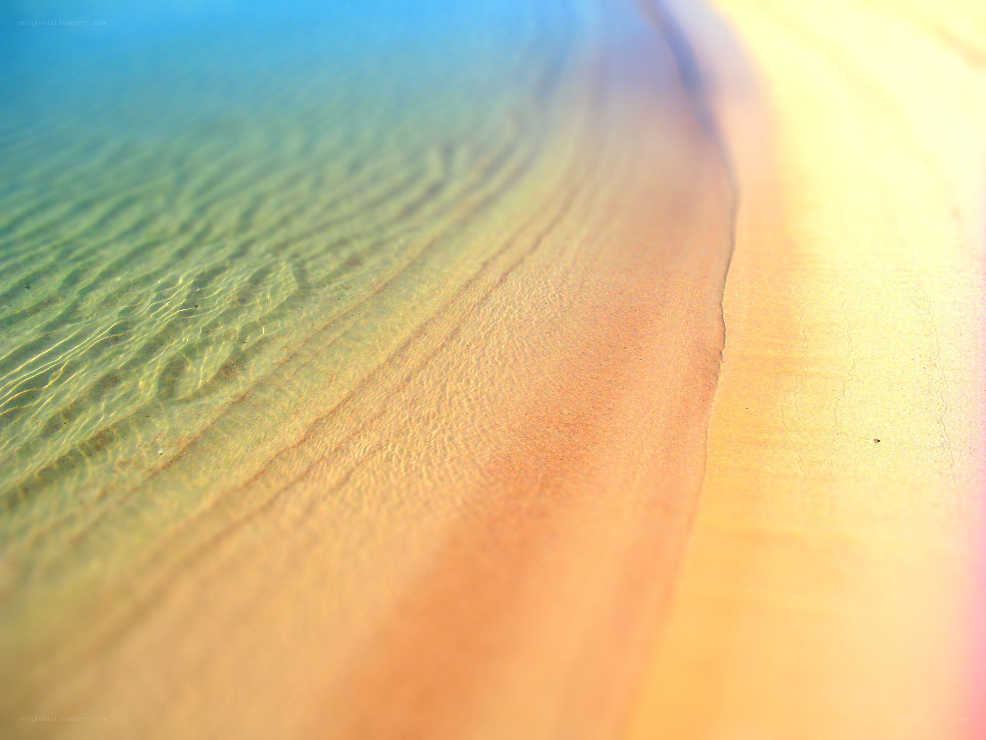 beach sand and clear water