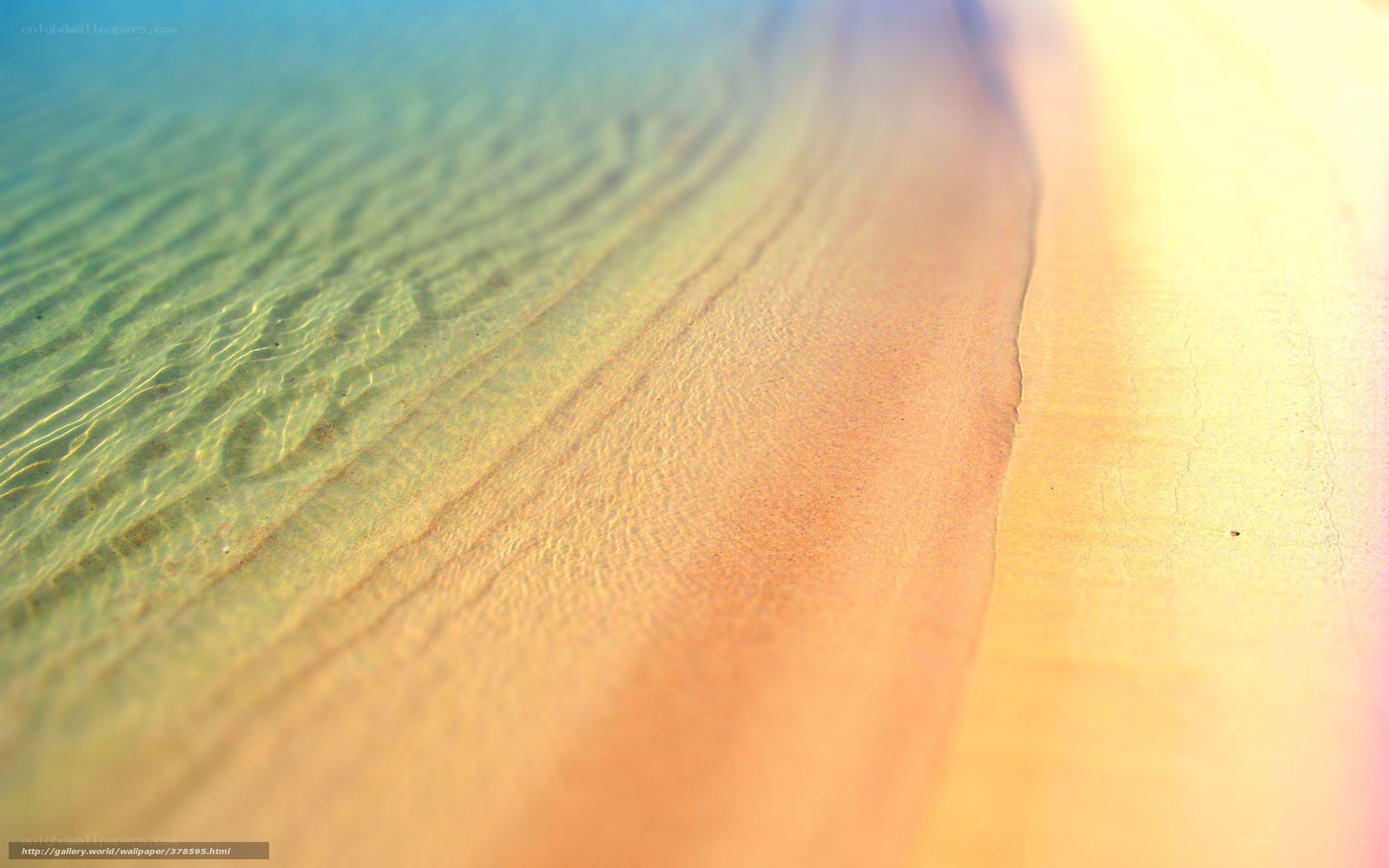 beach sand and clear water