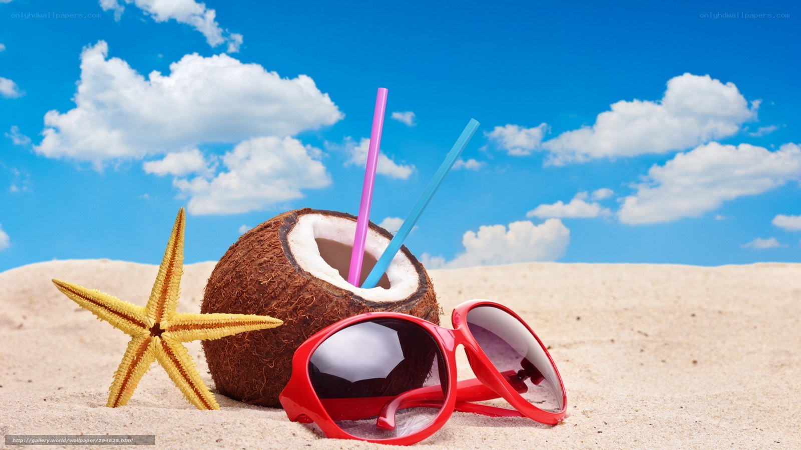 Beach scene with coconut and sunglasses