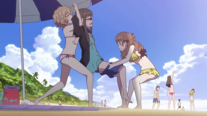 Beach scene with girls in bikinis