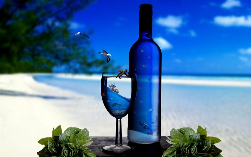 Beach scene with wine bottle