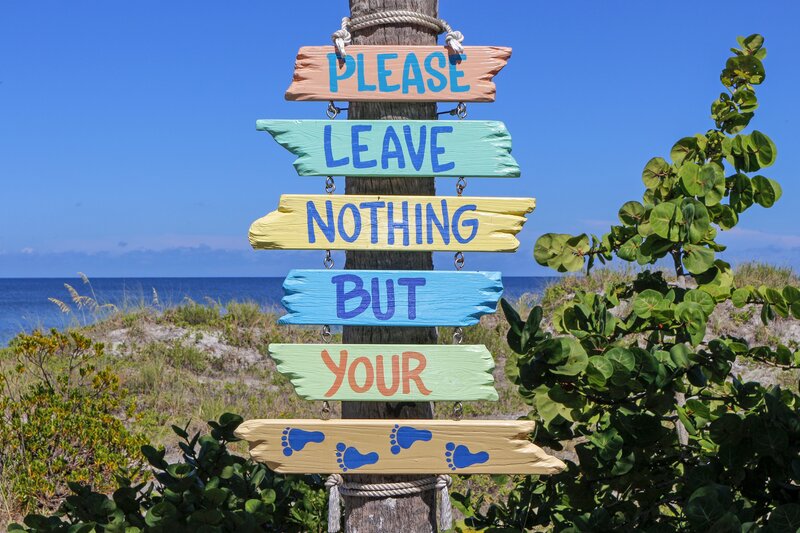 beach sign with message
