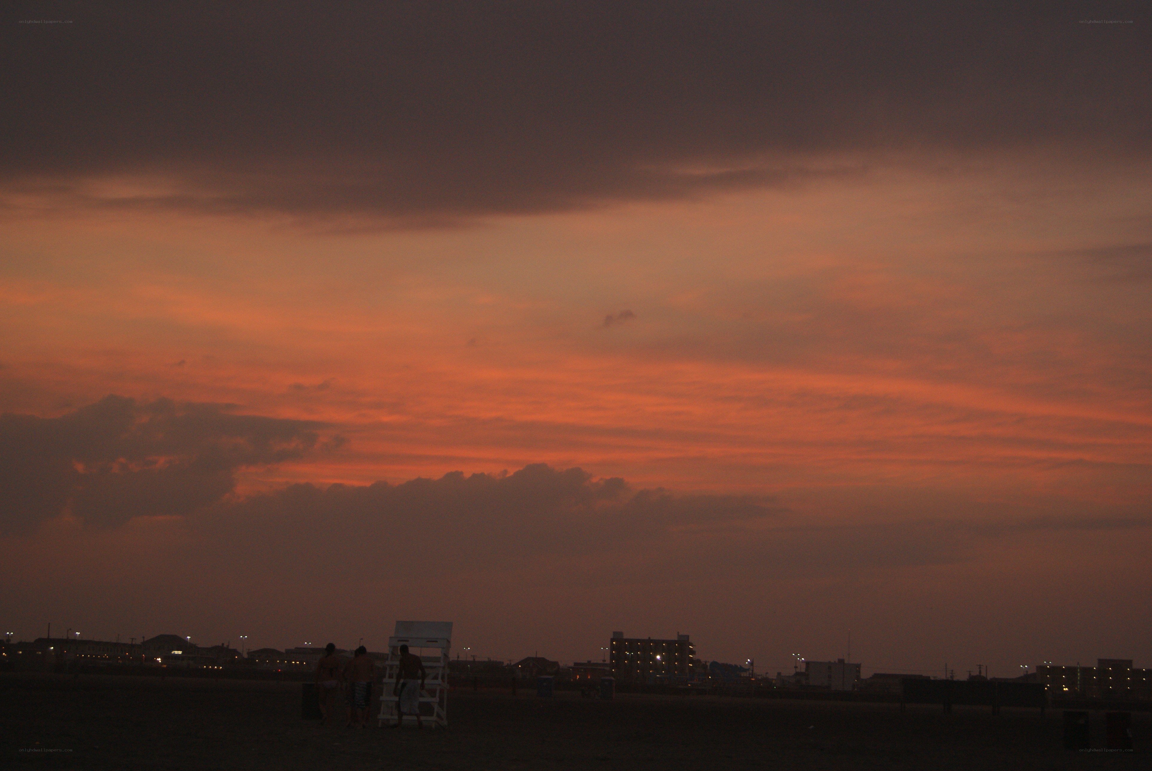 Beach sunset with lifeguard tower