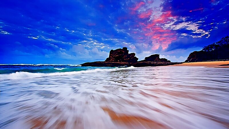 Beach sunset with rock formations