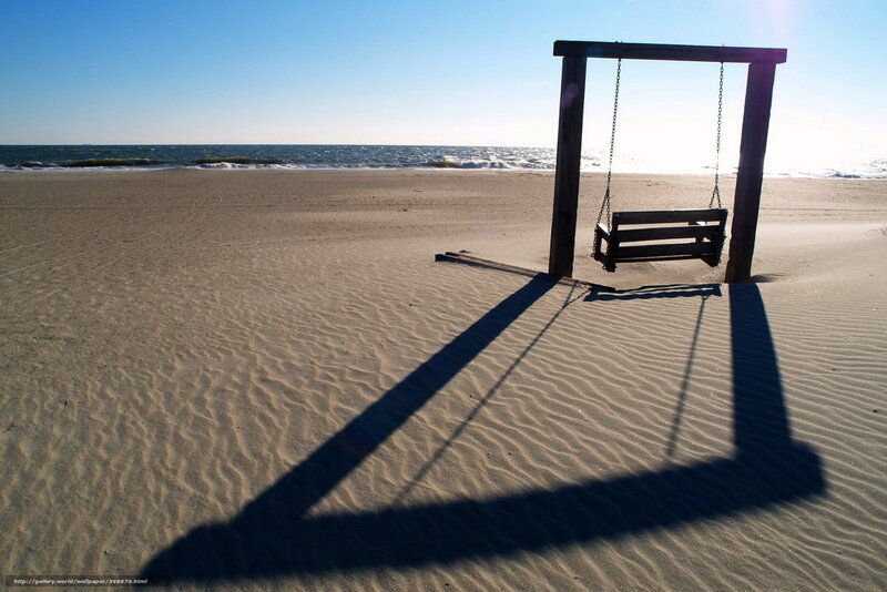 Beach swing at sunrise