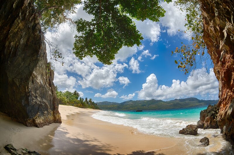 Beach Through Rock Arch