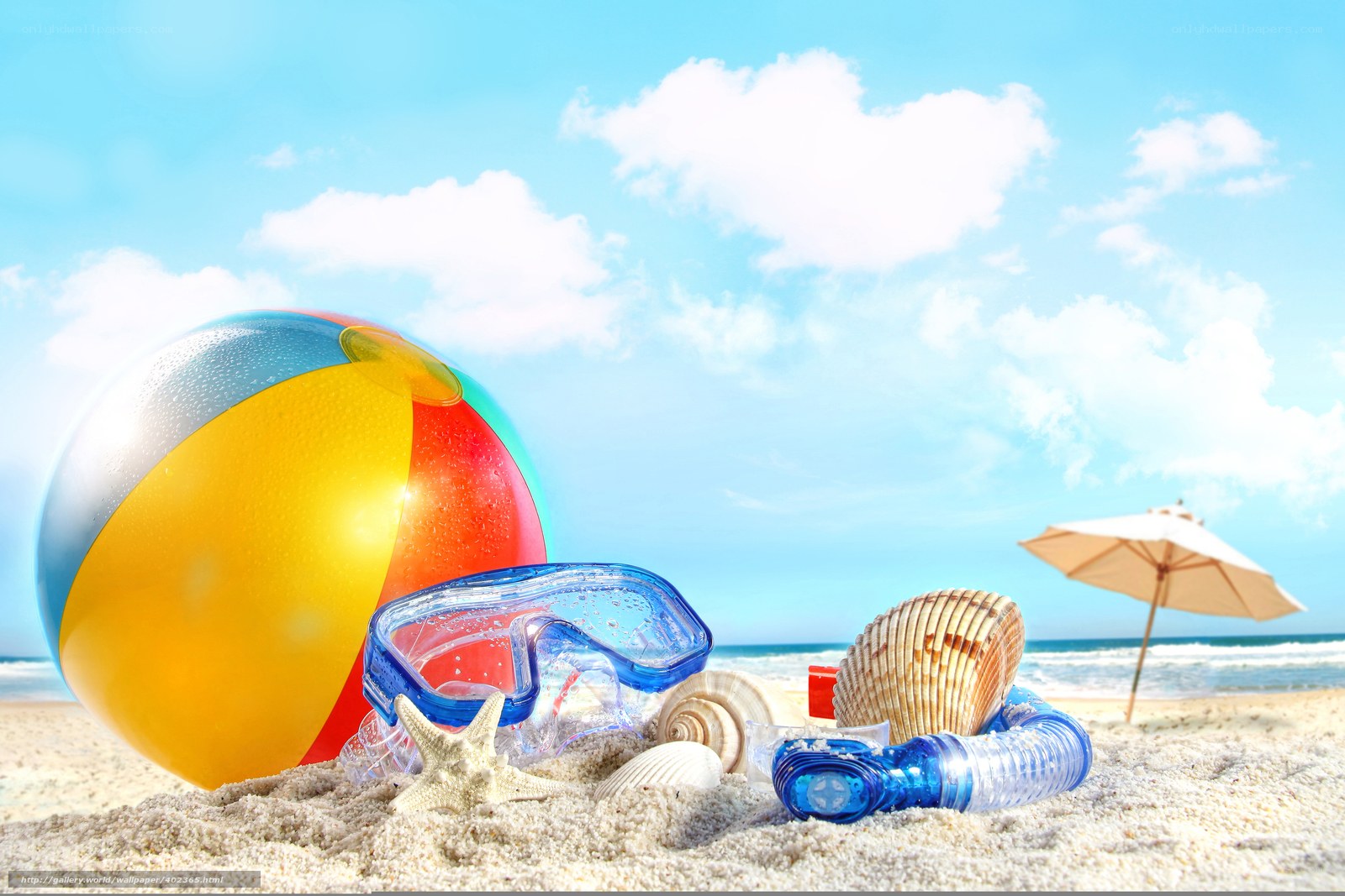 Beach toys on sandy shore