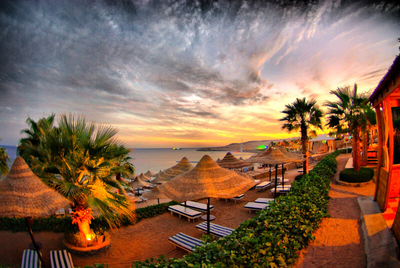 Beach Umbrellas at Sunset — Orange, Dramatic