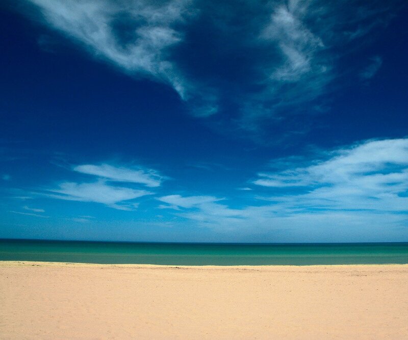 Beach under blue sky