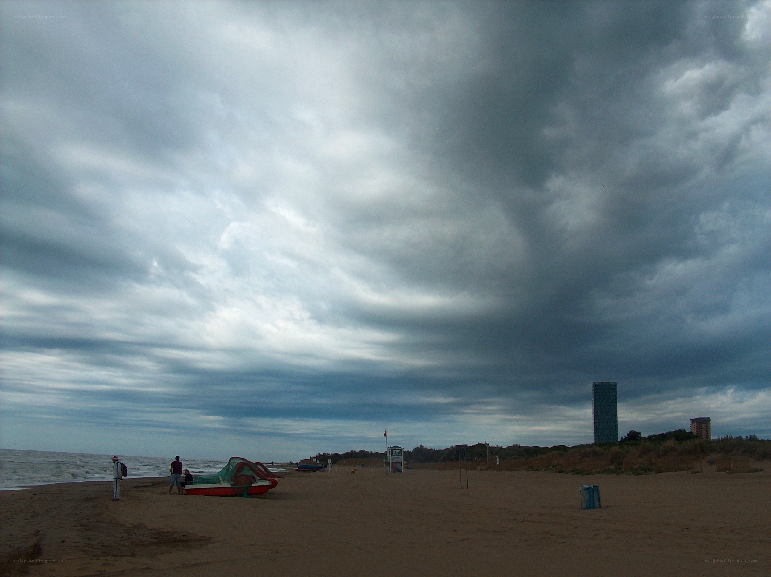 Beach under stormy sky