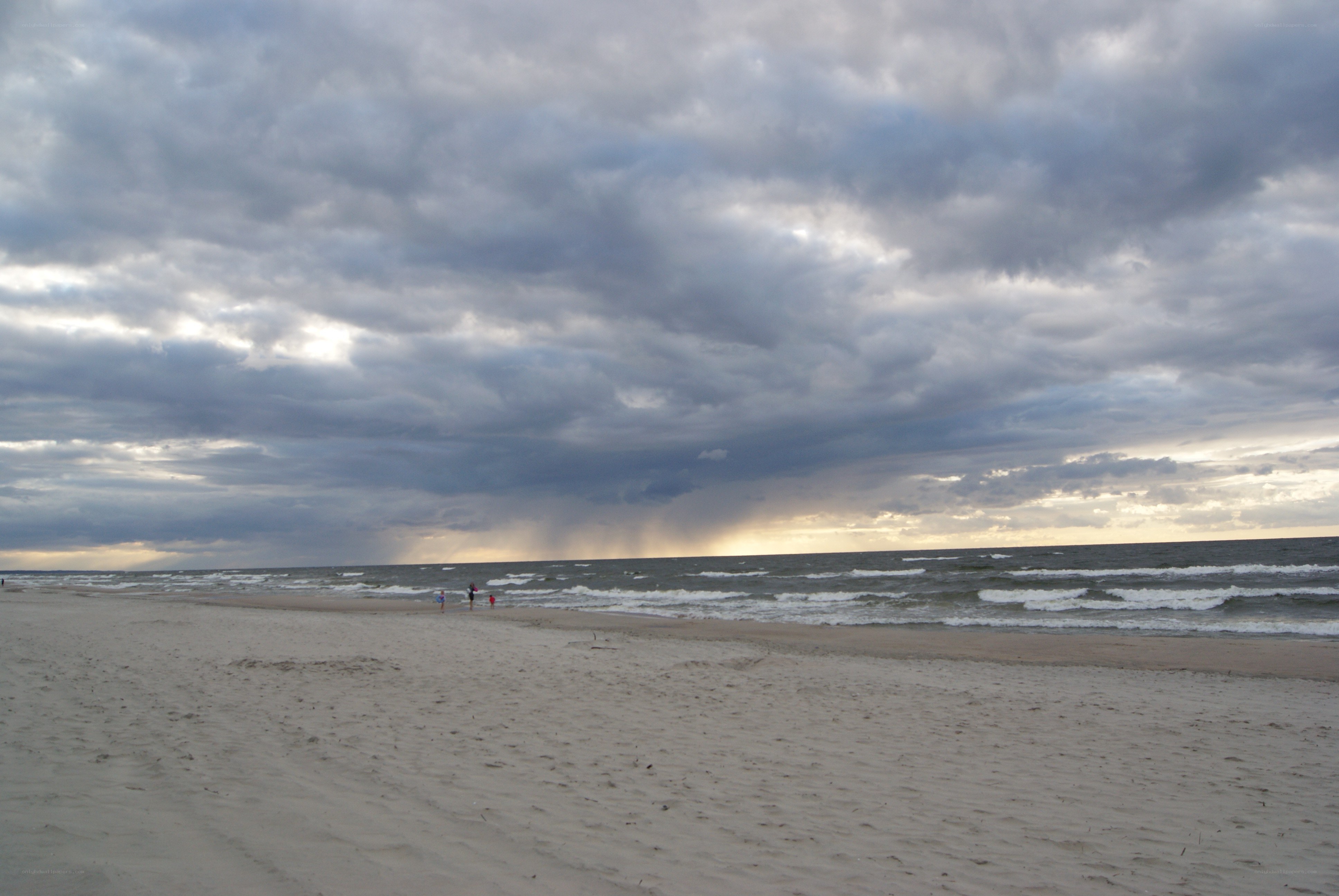 Beach under stormy sky