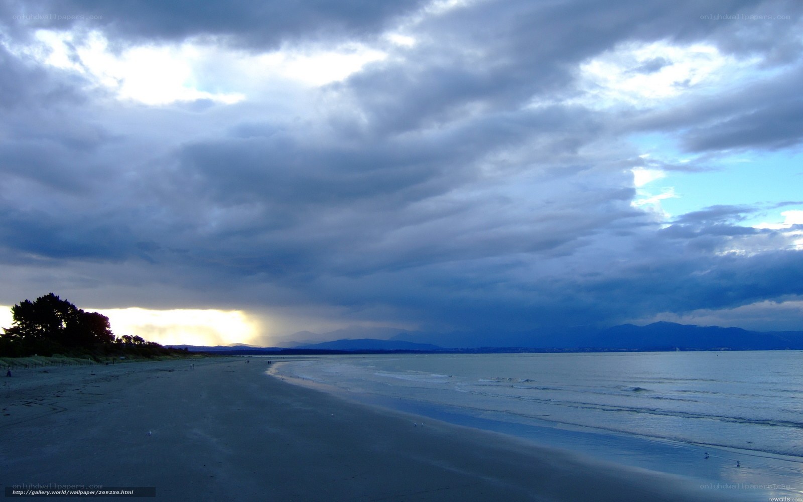 beach under stormy sky