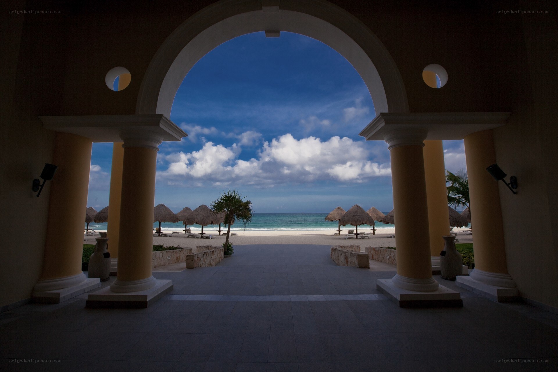 Beach view through archway